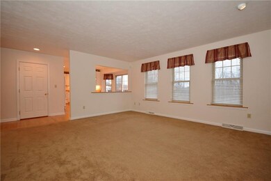 Family Room with ample windows for Natural Light.