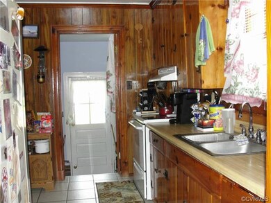 Kitchen looking into utility room