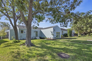 Charming single-story home with a light blue exter