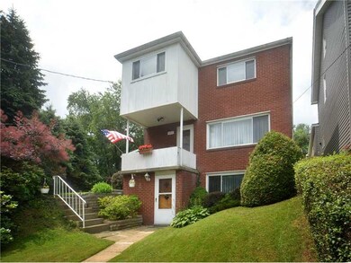 Exterior Front. Nicely manicured landscaping and b