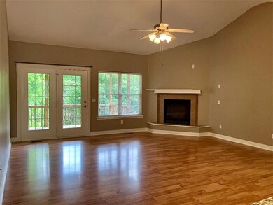 livingroom has corner propane fireplace