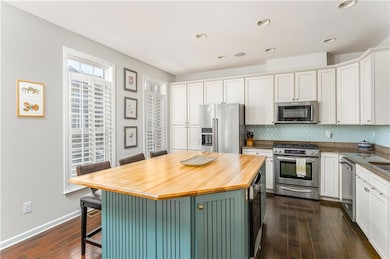Large custom island with beverage fridge