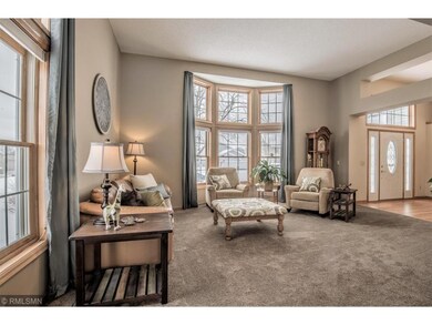 Living room offers abundant natural light.