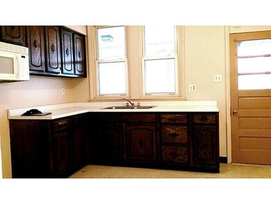 Kitchen. Eat In Kitchen Leads to Rear Covered Porc