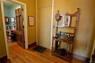 Enter into the kitchen, living room or private off