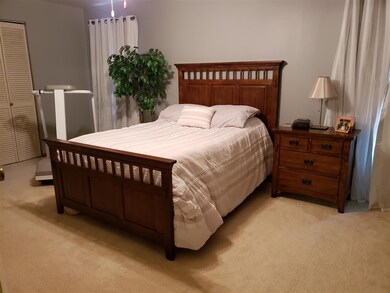 The huge master bedroom has plenty of space for a 