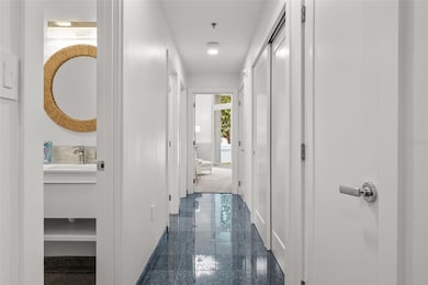 Hallway ahead to 2 x Guest Suites & Bathrooms