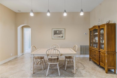 Dining area featuring baseboards, visible vents, a