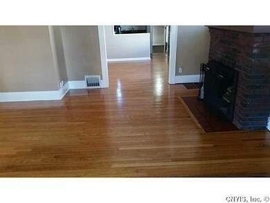 Living Room. Original hardwoods.    Fireplace work