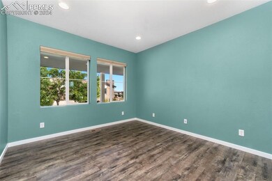Unfurnished room featuring wood-type flooring