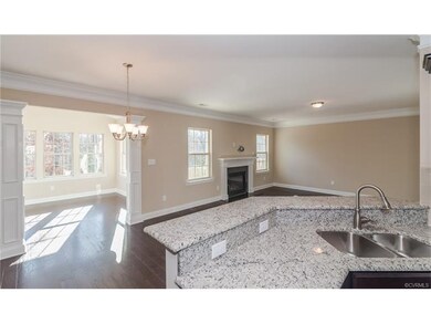 Granite kitchen counters with bar top of another C