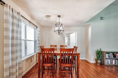 Enjoy dining here in this beautiful breakfast nook with natural lighting.  Open to the living room!