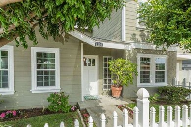 Freshly painted with new front door, picket fence,