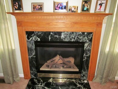 Gas fireplace heats the entire first floor.