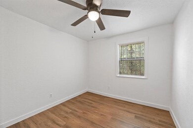 Spare room featuring hardwood / wood-style floors 
