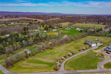 5.35 acres overlooking panoramic views for miles. 
