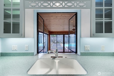 Double windows open out to the sun room