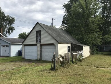 2 car garage with lean to and attic storage