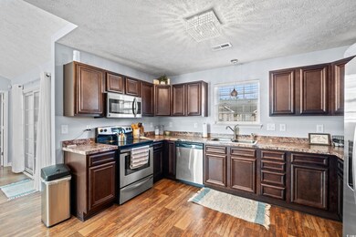 Kitchen with appliances with stainless steel finis