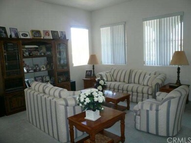 Formal living room with upgraded carpet.