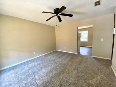 Den and view of kitchen