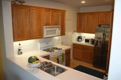 Enter the kitchen directly from the garage.