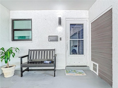 View of exterior entry featuring visible vents and