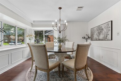 Formal dining room features a beautiful view of th