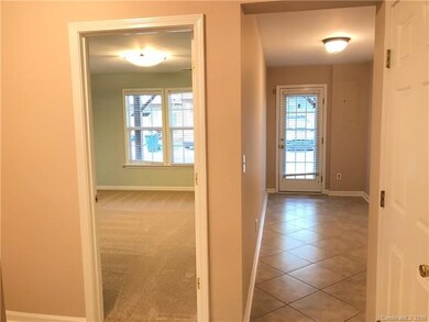 Downstairs bedroom on left. Hallway to back door t
