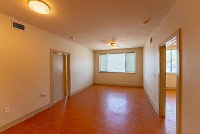 Unfurnished room with light wood-style flooring, 