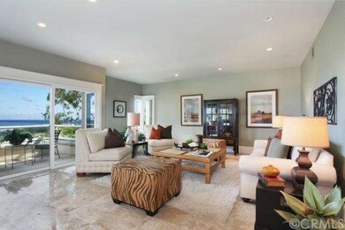 Fabulous Living Room With Sit-Down Coastline Views