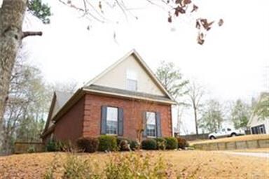 The wood deck is private and overlooks wooded area