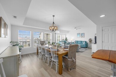 Dining room with recessed lighting, visible vents,