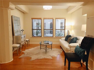 INSIDE UNIT OVERLOOKING THE SUNNY ATRIUM..BEAUTIFU