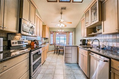 Kitchen with granite countertops, solid wood cabin