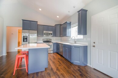 Kitchen with Access (right) to Deck