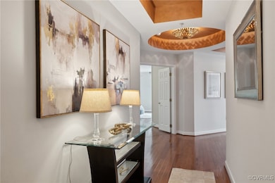 Impressive entrance hallway features wood floors,