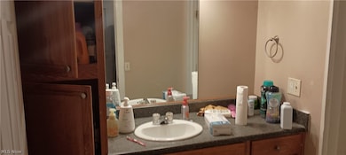Bathroom featuring vanity UP