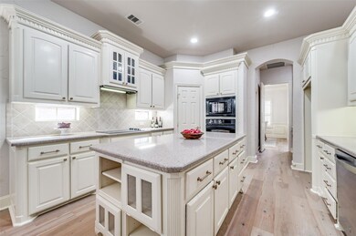 Kitchen has ample storage with separate pantry and