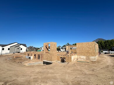 Back of house with a pergola