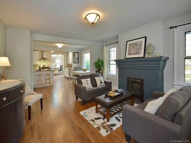 Living Room Looking Through to Kitchen and Dining 