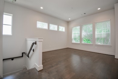 Open floorplan with Don Greene Nature Park behind home
