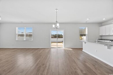 Unfurnished dining area featuring light wood-style flooring