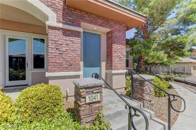 Entrance to property with stone siding
