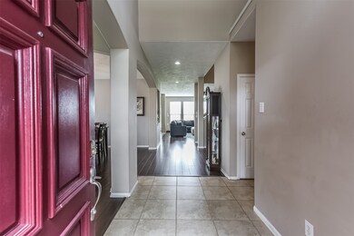 Tiled entry and high ceilings welcome you thru the front door.