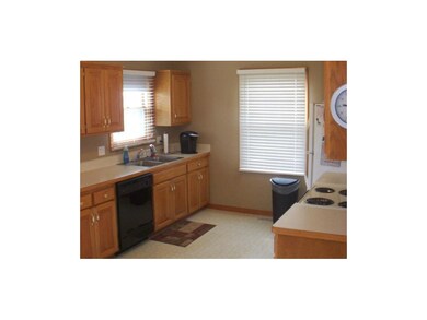 Kitchen has large work area and very nice cabinets