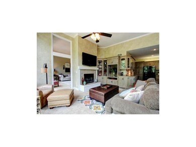 The hearth room provides a see-thru ceramic tile f