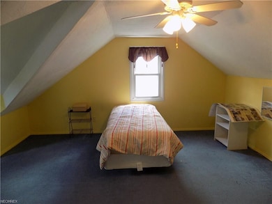 large upstairs converted 3rd bedroom.