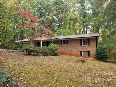Home surrounded by woods. 