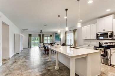 Tile floors throughout except bedrooms which are c